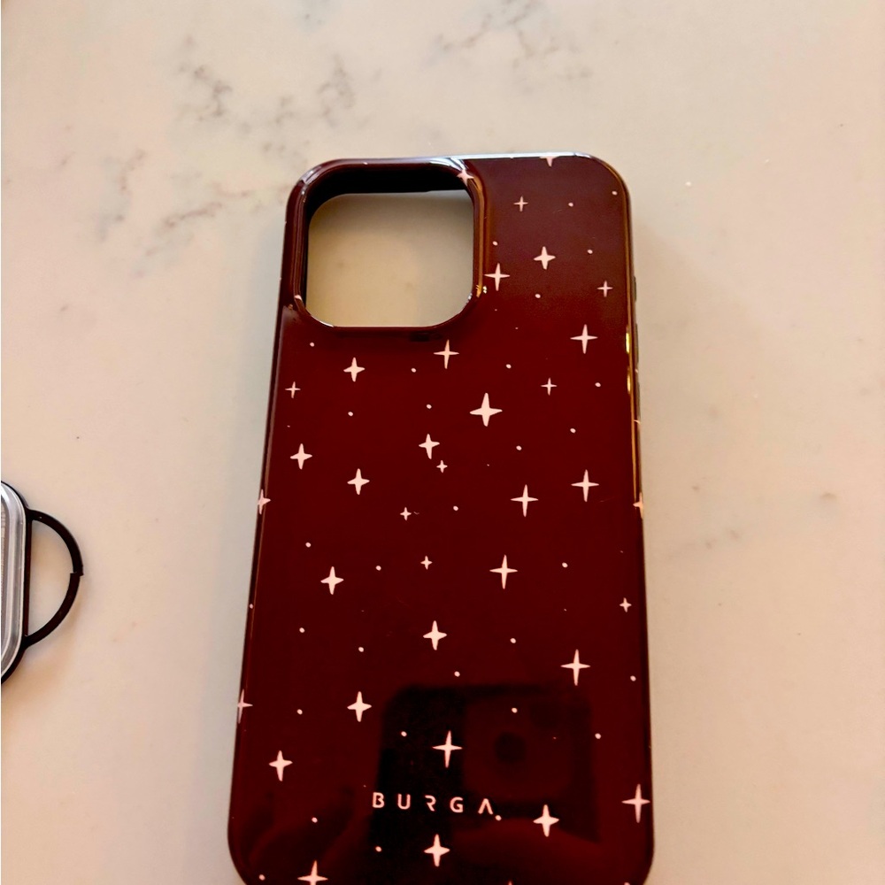 1phone 15 pro hard case with ring holder and special glam lenses 
Brand new